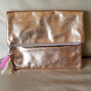 New rose gold metallic clutch bag